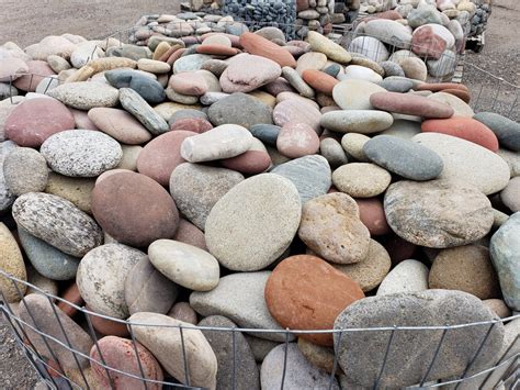 Buy rocks near me - The price of a landscape rock delivery may fluctuate based on the load’s size. A standard gravel order usually spans 8 to 20 cubic yards. It also weighs between 10 to 20 tons. With variables like material, distance, and volume in play, such an …